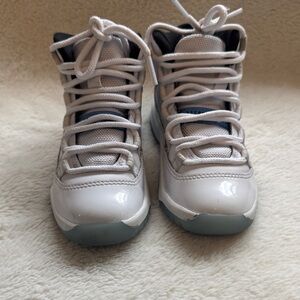 Jordan 11 Kids White and Legend Blue Sneakers